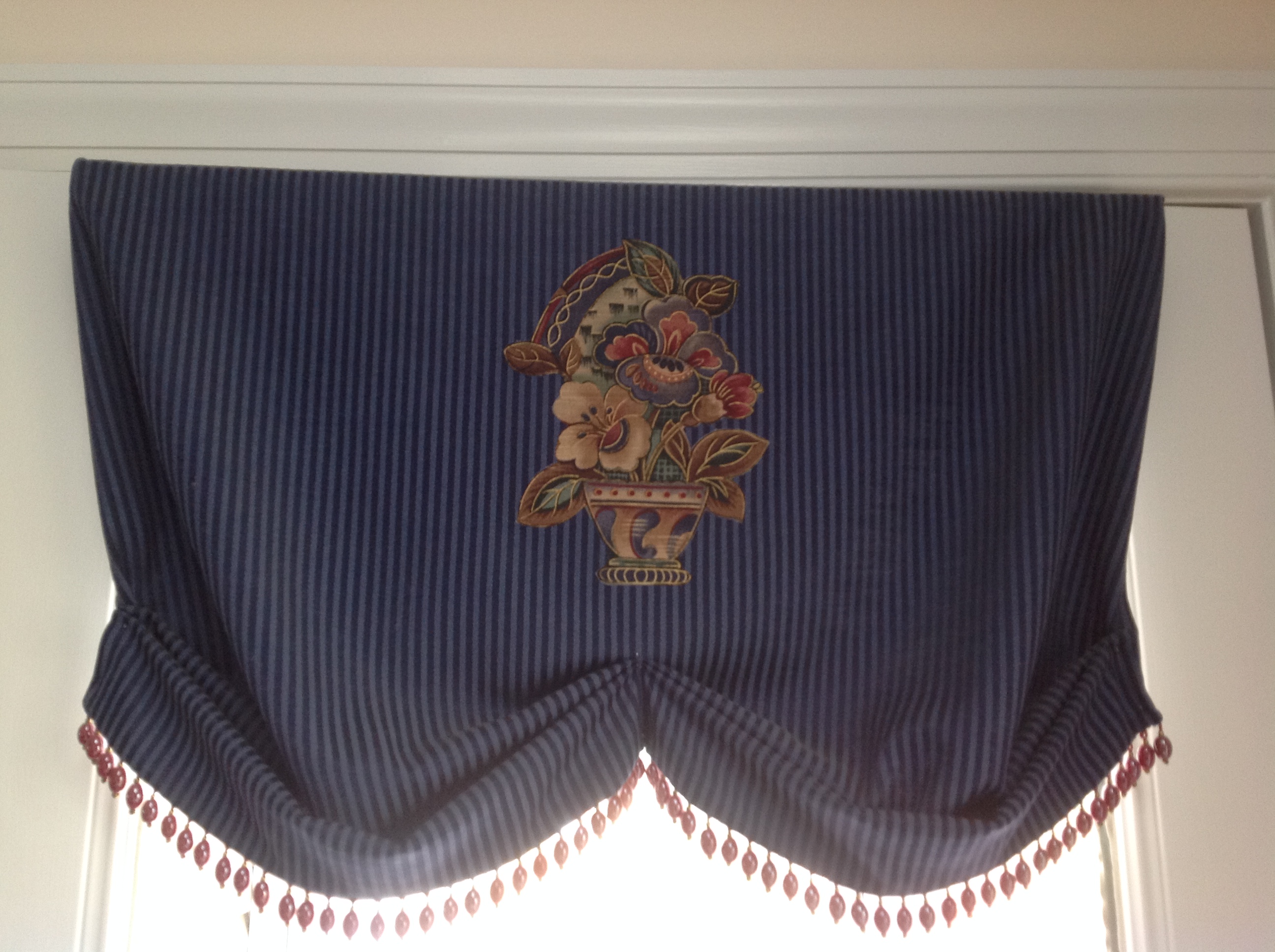 Coordinating valance (to scalloped valance with bells in Kitchen window) installed on french door in kitchen