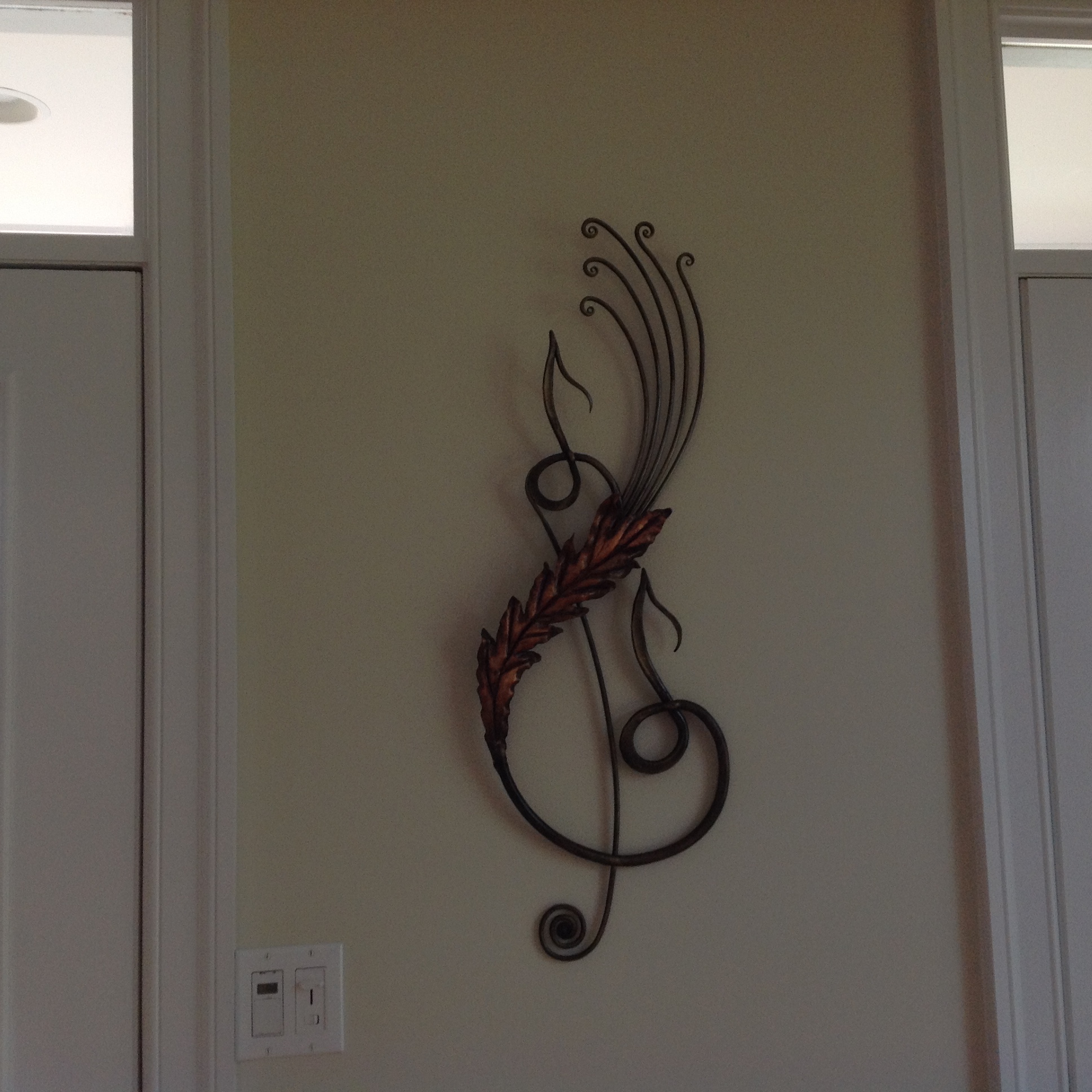 Custom made musical note wall decor for piano room
